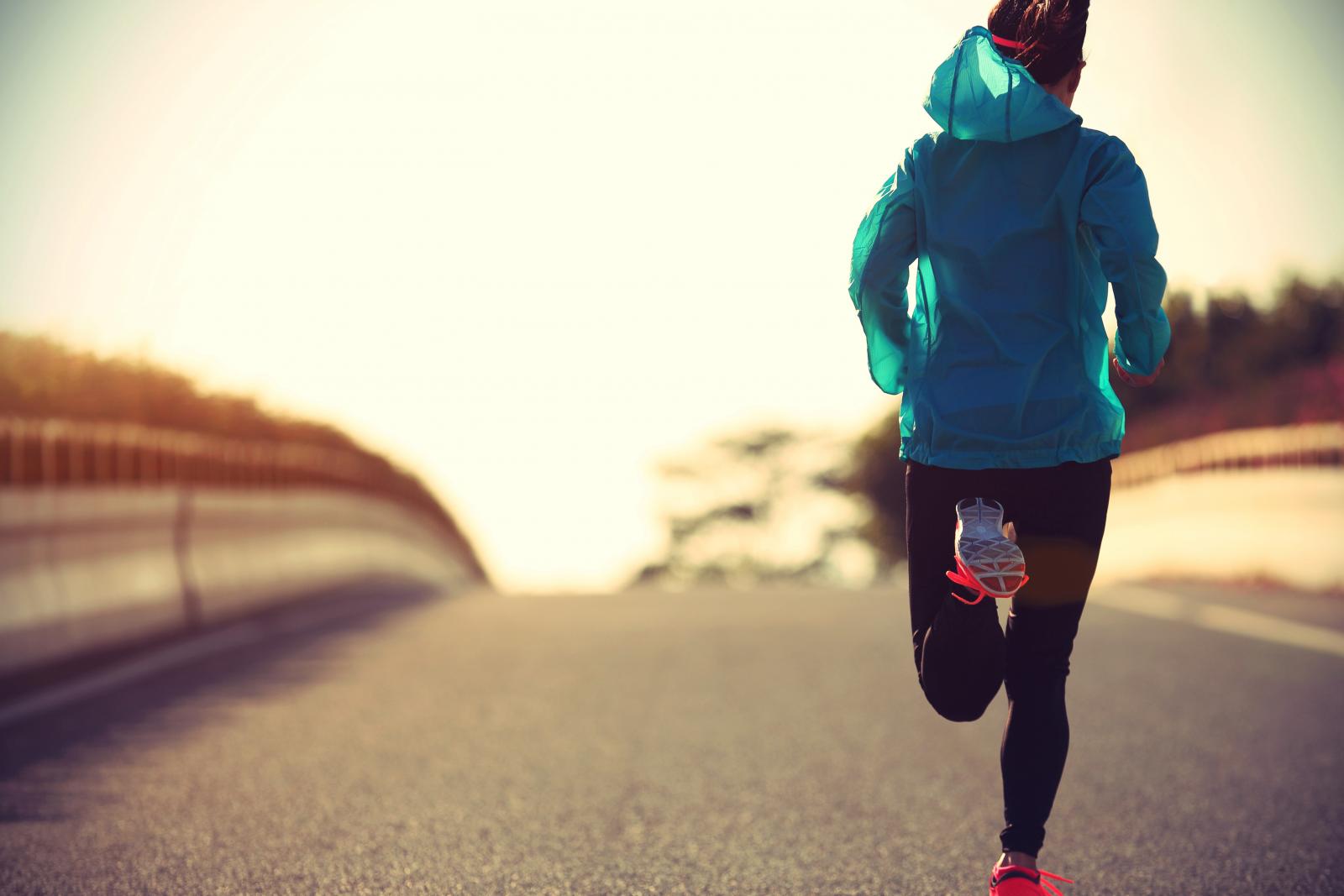 A runner at sunrise